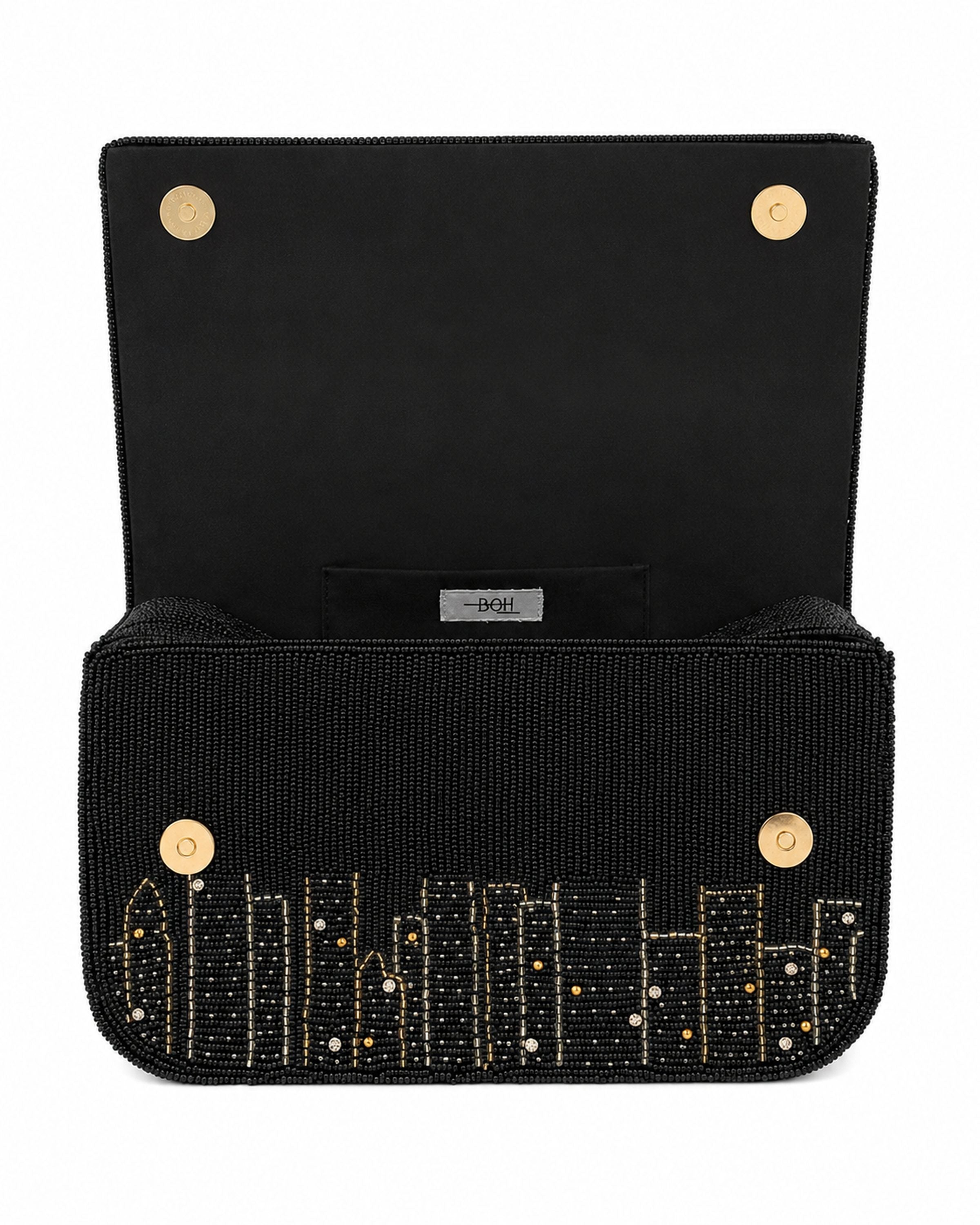 Black handbag with New York city skyline design on a white background (beaded & handmade) 

