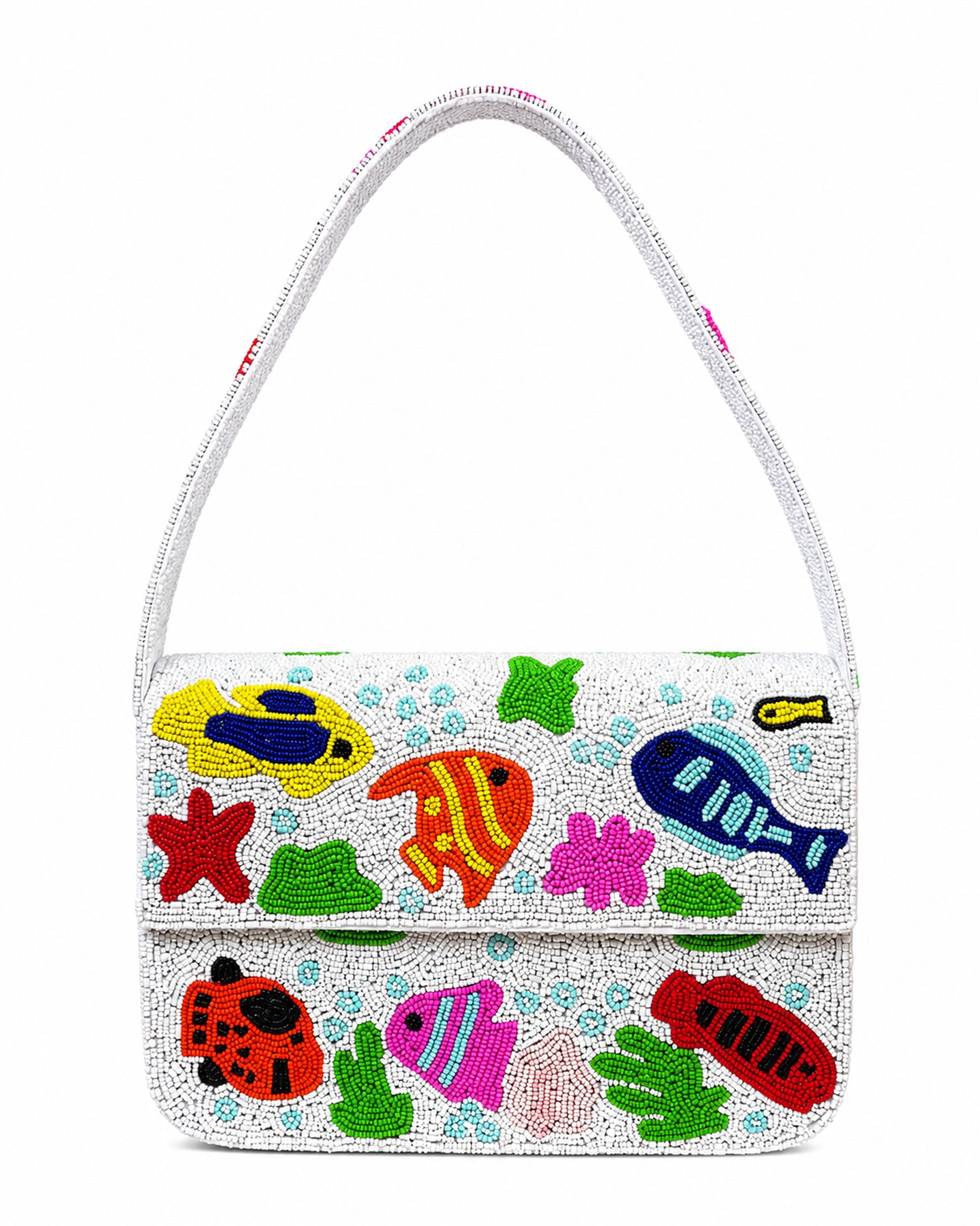 Colorful beaded handmade bag with fish and sea-themed designs on a white background