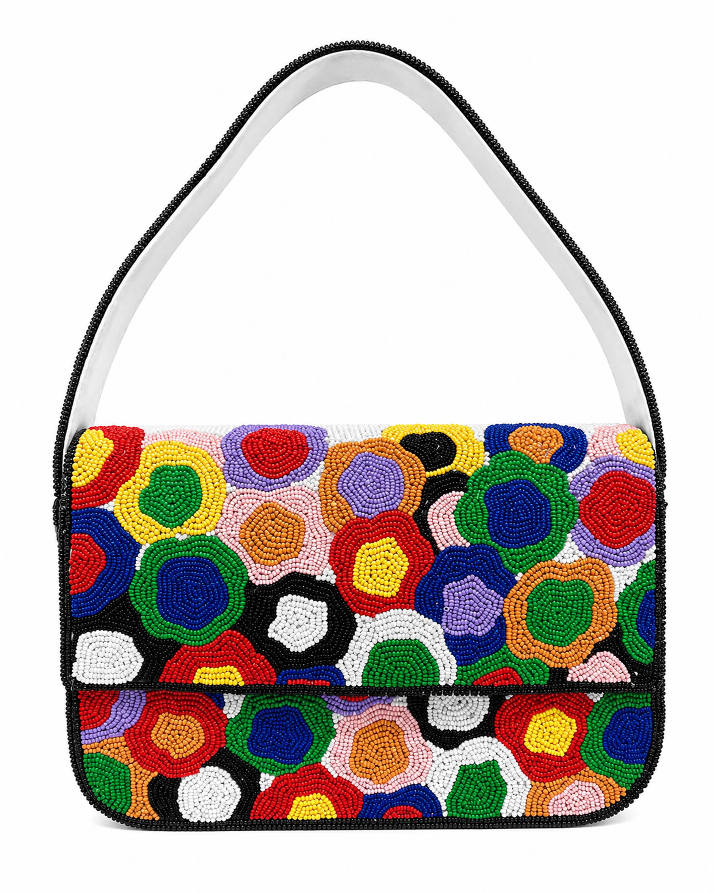 Colorful floral-patterned handbag with a white handle on a white background (beaded & handmade)