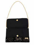 Black clutch with celestial designs including sun, moon, and stars on a white background (beaded & handmade)