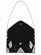 Black and silver beaded clutch bag on a white background sequined and handmade