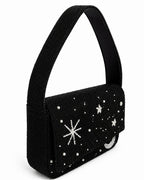 Black beaded handmade bag with star and moon designs on a white background