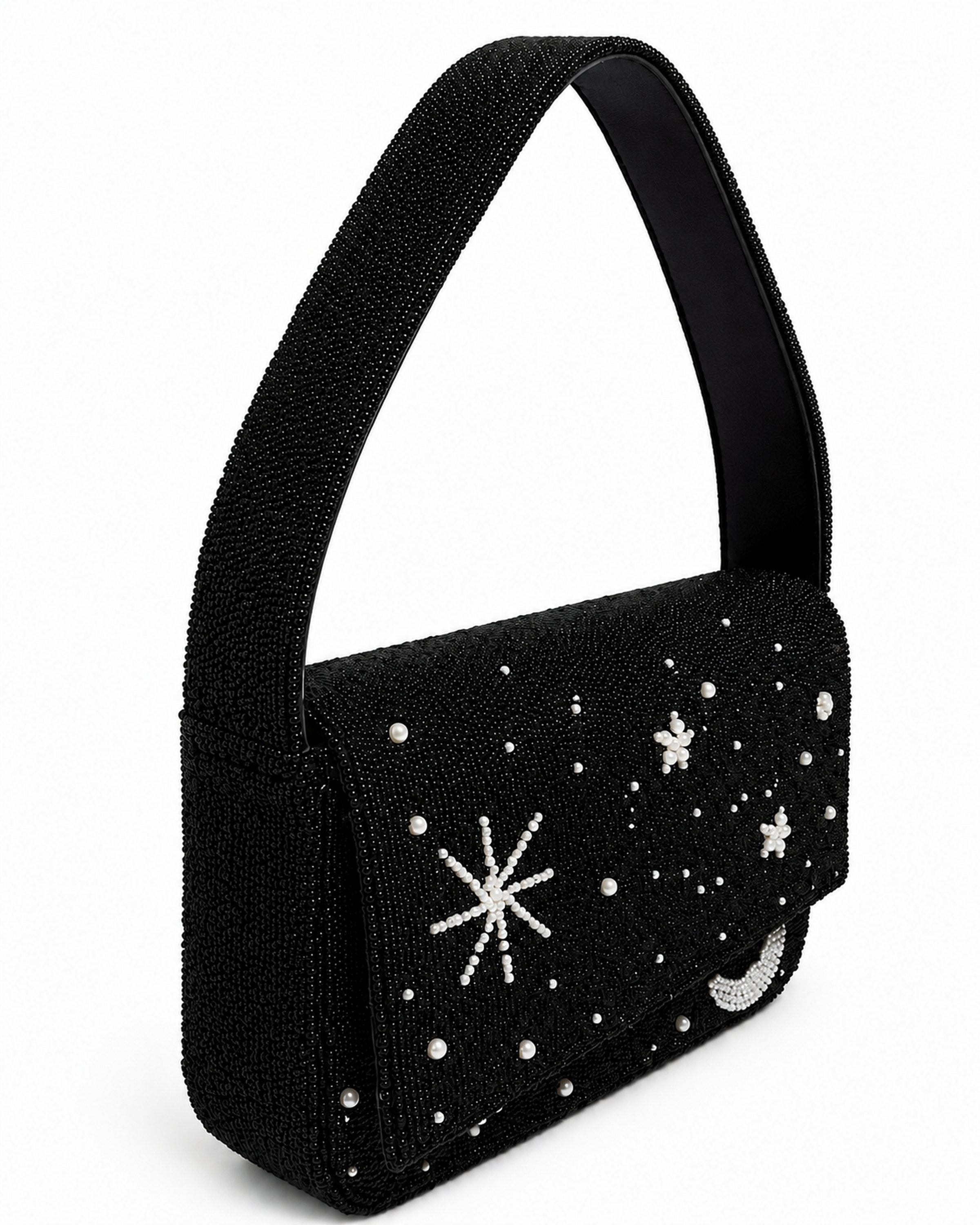 Black beaded handmade bag with star and moon designs on a white background