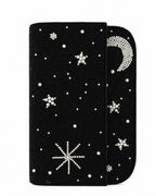 Black beaded handmade bag with star and moon designs on a white background