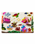 Colorful beaded clutch with underwater scene design on a white background