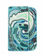 Turquoise handbag with ocean wave decorative pattern on a white background (beaded & handmade)