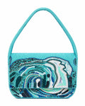 Turquoise handbag with ocean wave decorative pattern on a white background (beaded & handmade)