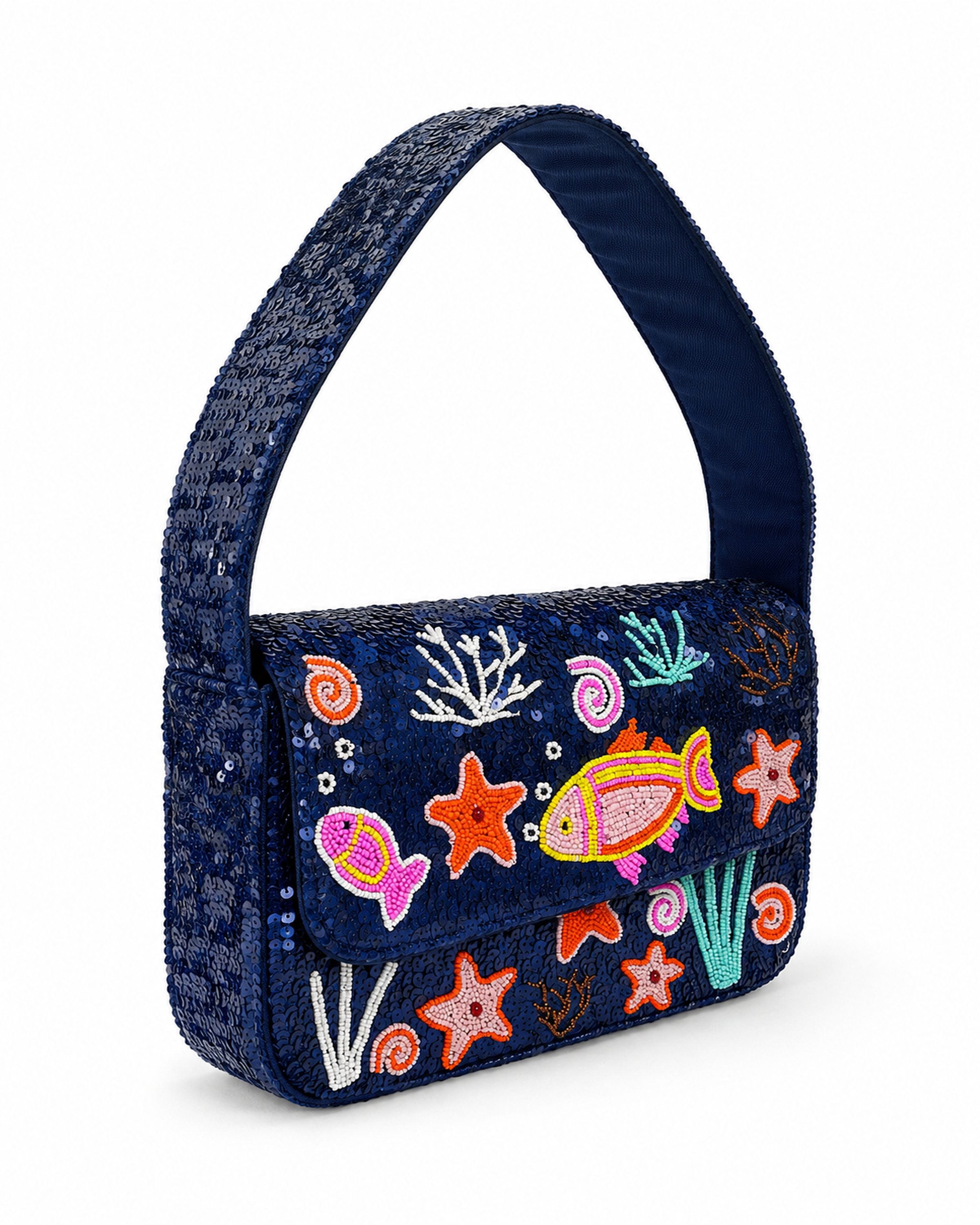 Navy blue handbag with colorful embroidered sea-themed designs on a white background (handmade beaded bag)