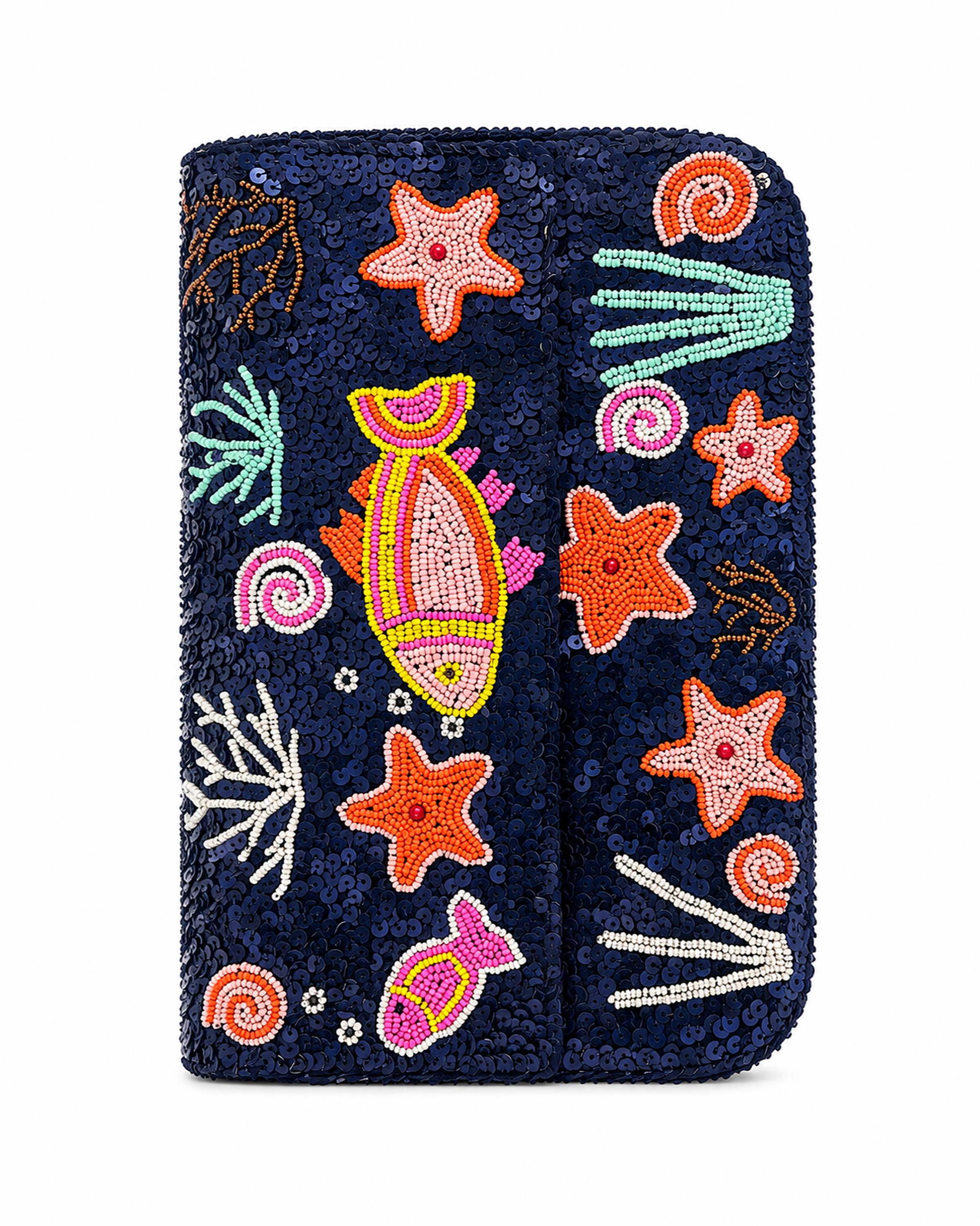 Navy blue handbag with colorful embroidered sea-themed designs on a white background (handmade beaded bag)